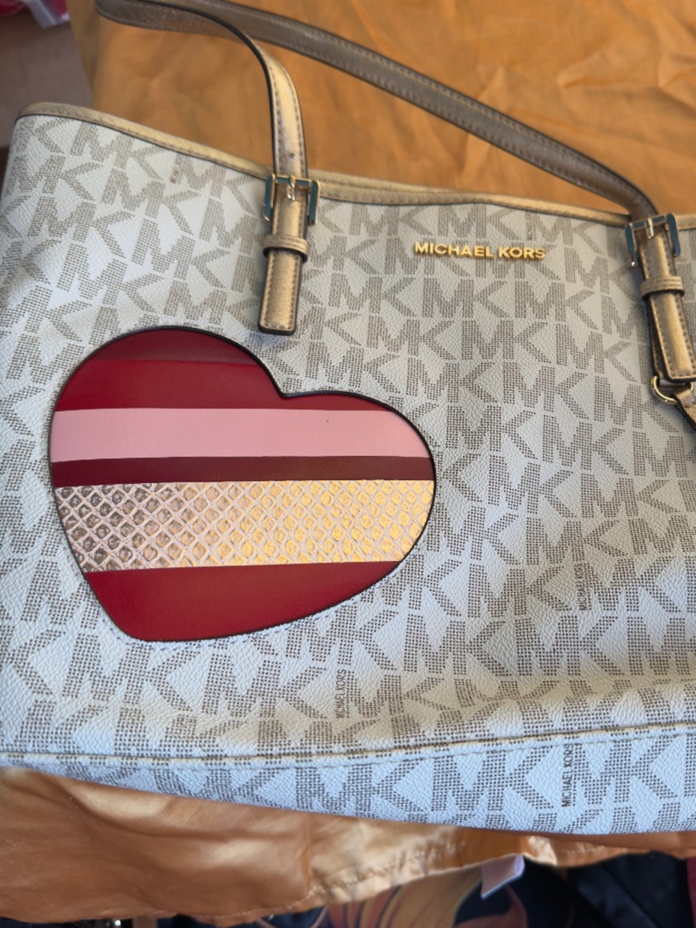 Micheal Kors purse with Red heart on front